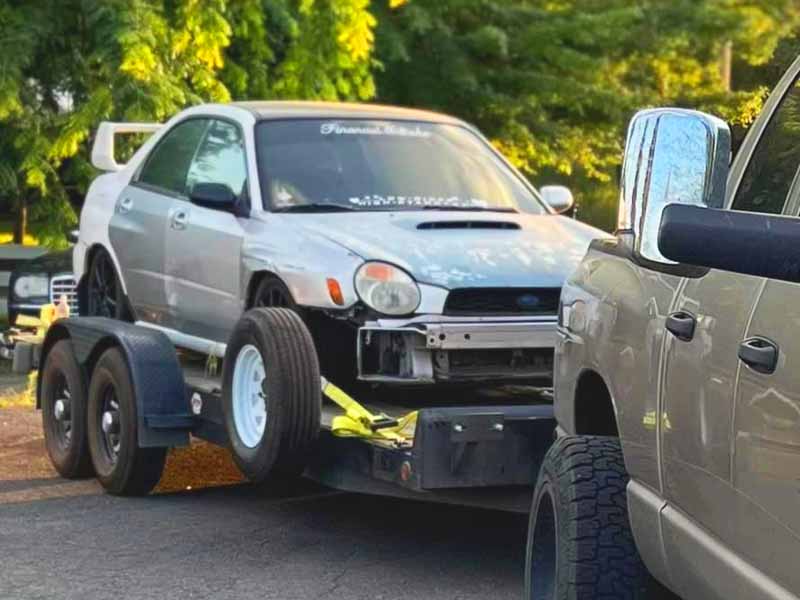 Emergency vehicle recovery with affordable Titan Trailer rental as tow truck alternative in Spokane