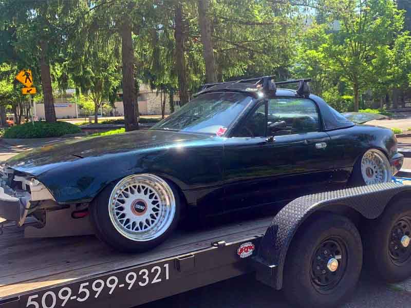Track day preparation with race car on Titan Trailer rental in Washington state